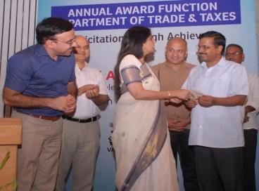 Chief Minister felicitates high achievers of Trade and Taxes Department., 16th June 2016