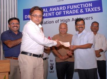 Chief Minister felicitates high achievers of Trade and Taxes Department., 16th June 2016