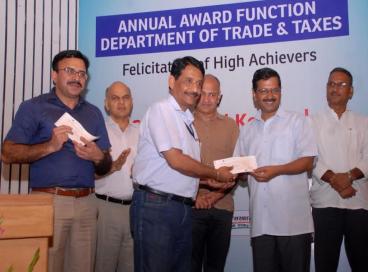 Chief Minister felicitates high achievers of Trade and Taxes Department., 16th June 2016